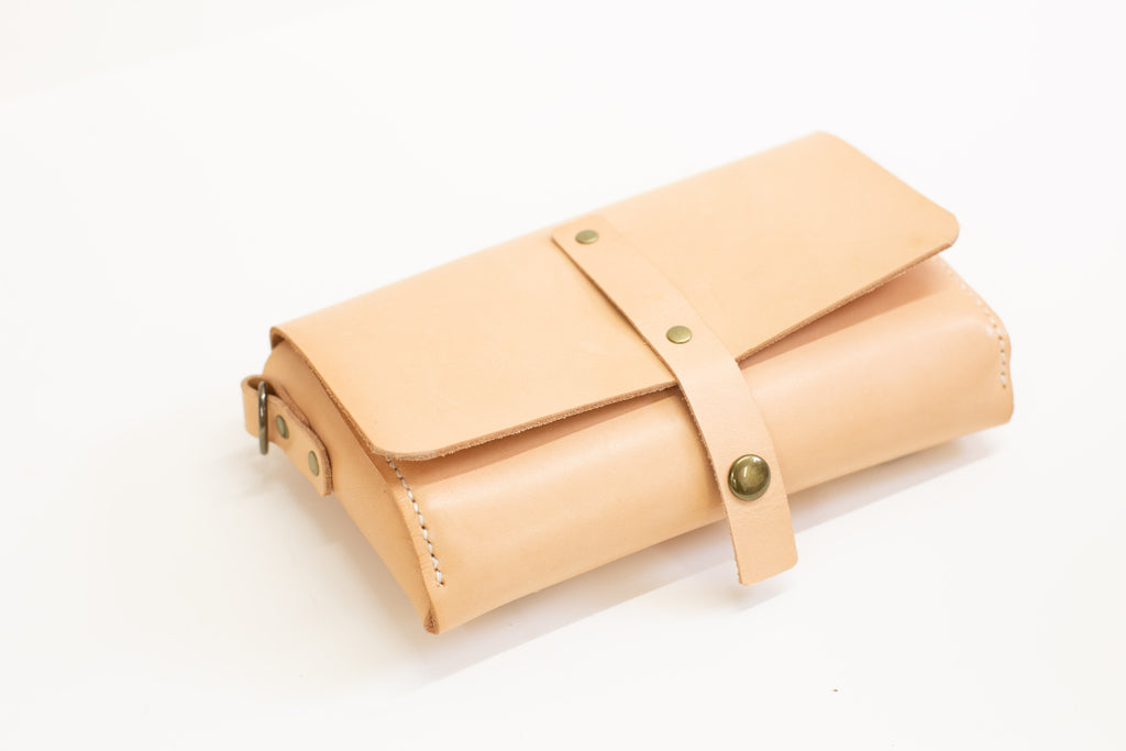 The hip and crossbody strap can be taken off the leather hip bag and it can be worn as belt bag. 