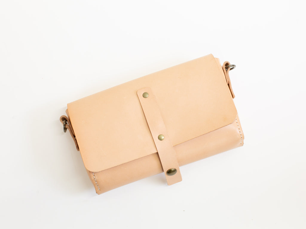 The leather belt bag is made with non-toxic veg tan leather that is sourced sustainably from cattle from organic and regenerative farms. 