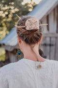 The large leather barrette with mushroom design works great for messy buns and quick hair-dos. 