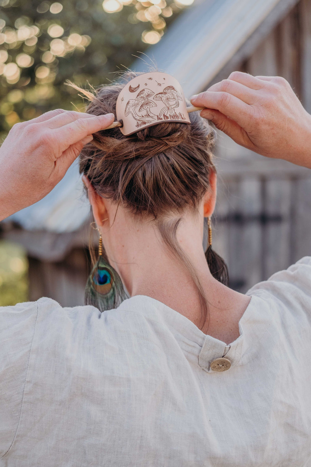 The large leather barrette matches natural clothing and is a perfect gift for whimsical nature people. 