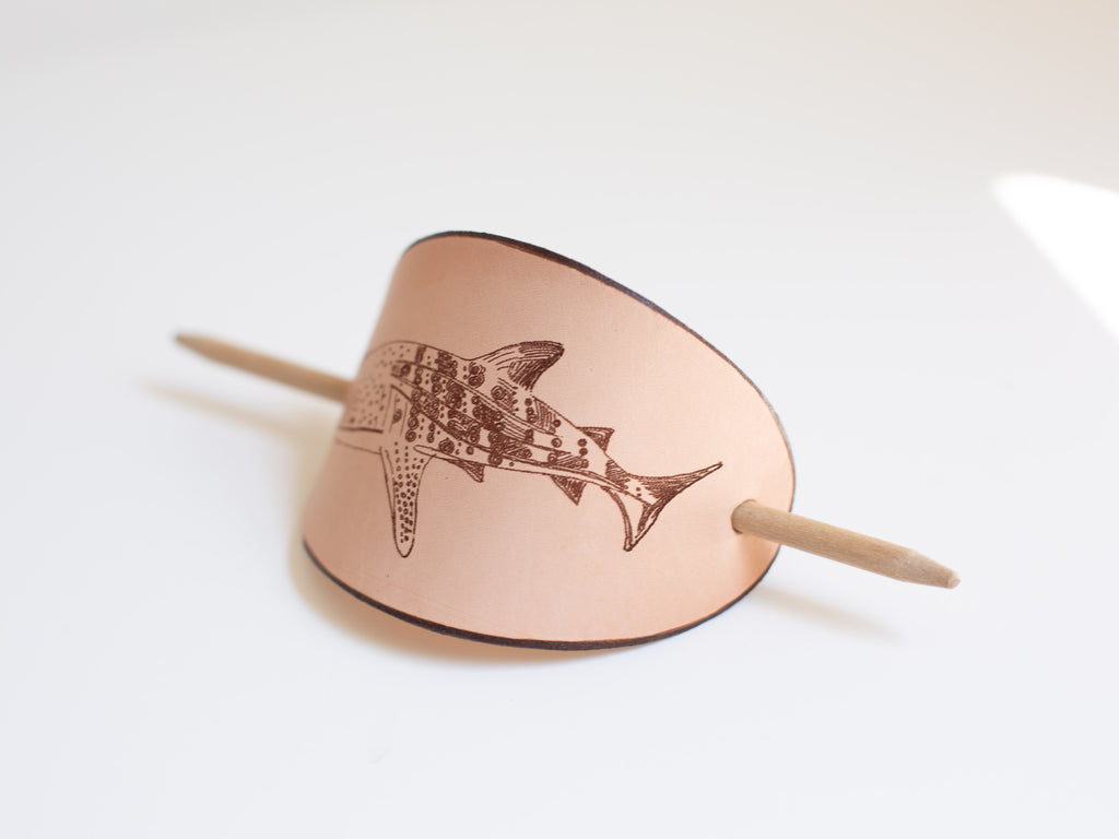 The sustainable leather barrette is large for long and thick hair and quick messy buns. The whale shark laser engraving is an original art work. 