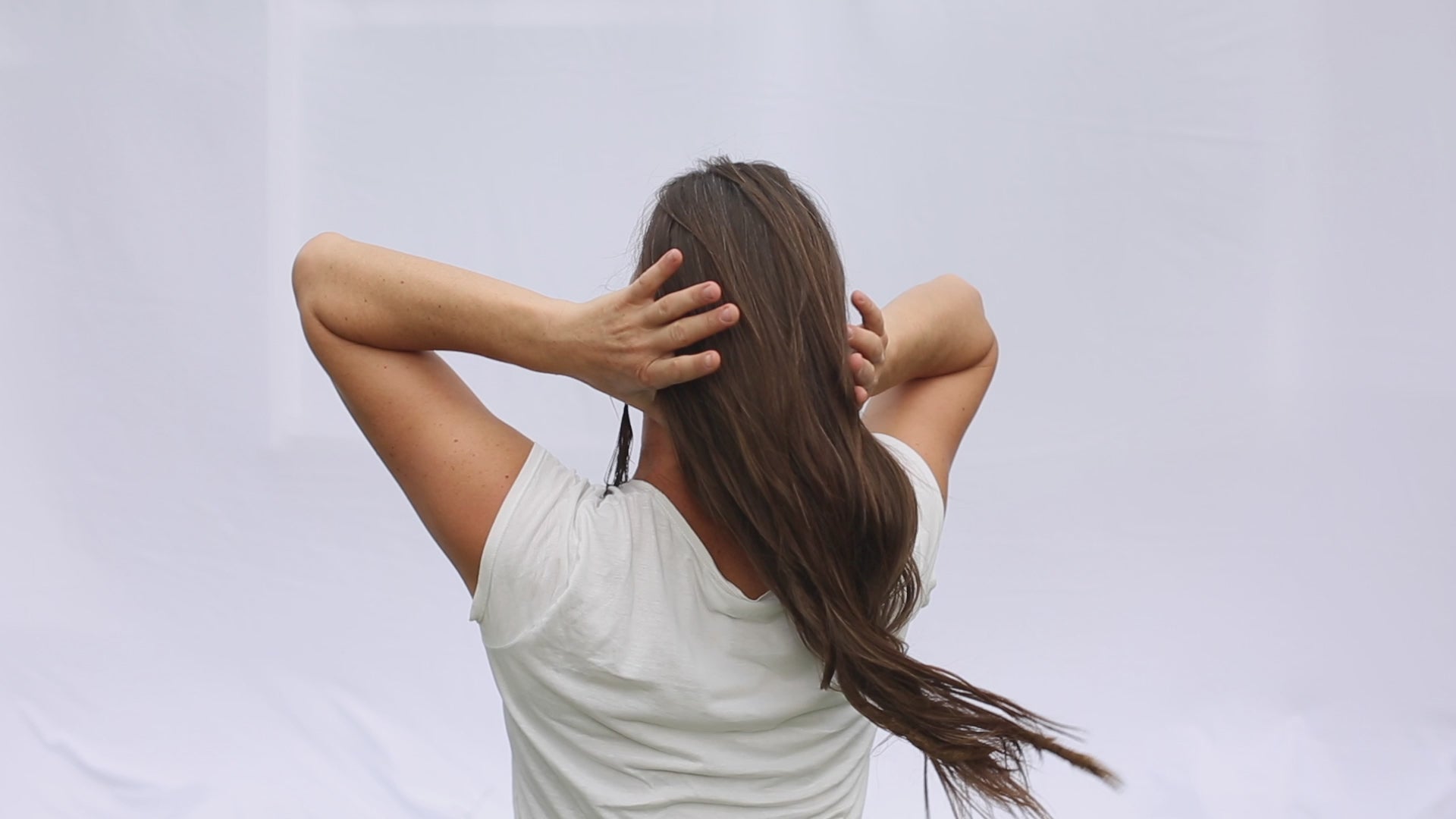 The short video shows how to use a leather hair stick barrette for a quick hair-do. 